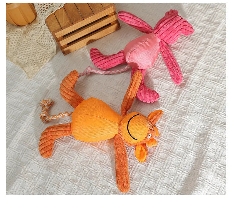 Plush dog toy in cow and pig design with squeaker, 40 x 32cm, orange or pink
