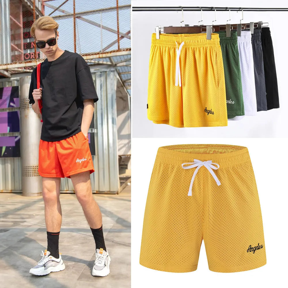 Men's black double-layer mesh sport shorts made from polyester fabric.