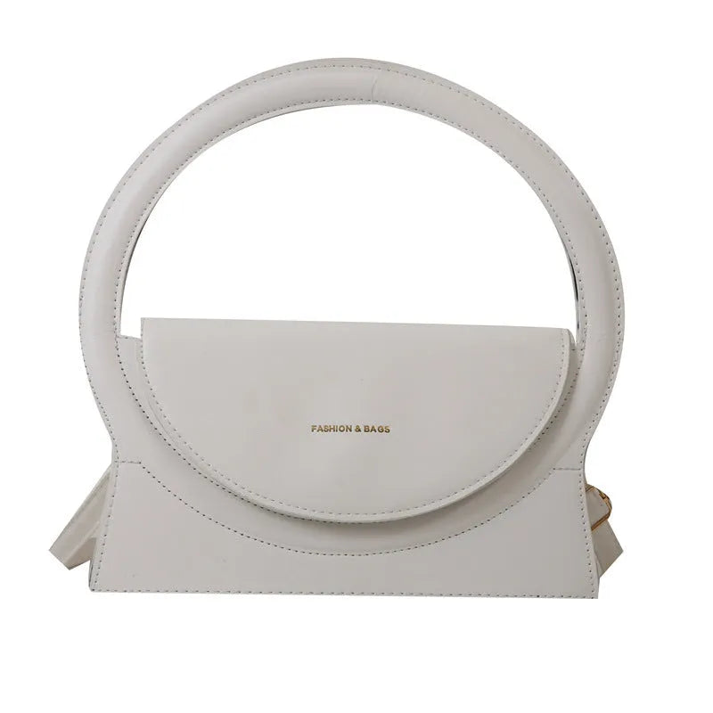 Horizontal square messenger bag in black with stitching detail and shoulder strap