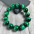 Green tiger eye stone bracelet with polished geometry beads showing five size options