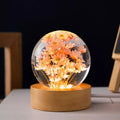 Dandelion in transparent resin crystal ball on beech wood base, with button switch and USB cable, 60mm size