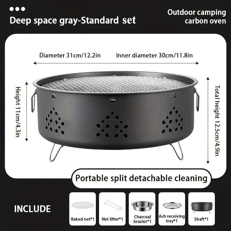 Portable stainless steel barbecue grill with detachable parts on a grassy outdoor surface.