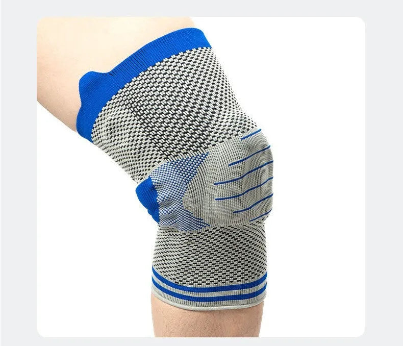Silicone massage spring bar shock absorber knee protector in black and blue colour on leg.