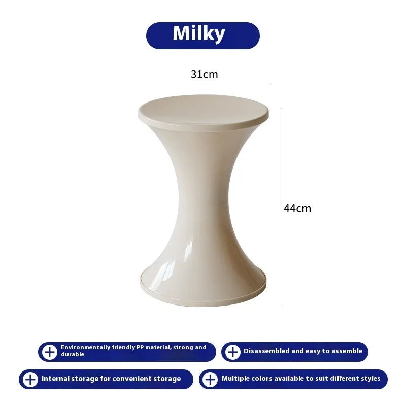 A plastic hourglass-style shoe changing stool in one of five available colours.