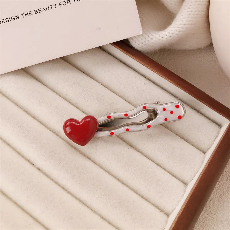 Red stereo love heart-shaped hairpin with French retro dots and willow leaf design