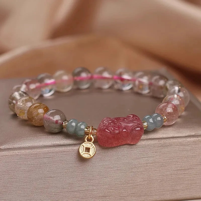 Coloured hair crystal bracelet with single circle design and chosen charm: cat's paw, purse, flower, or zircon butterfly