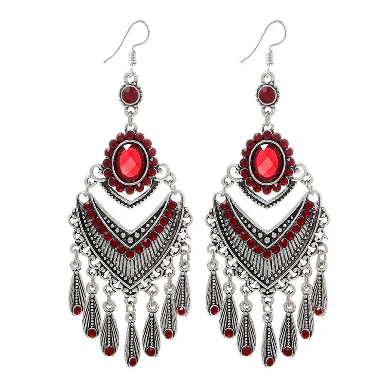 Purple retro drop earrings with long crystal fringe detailing and ethnic styling elements