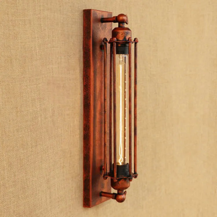 Industrial retro flute wall lamp in iron, shown in black finish on a brick wall.