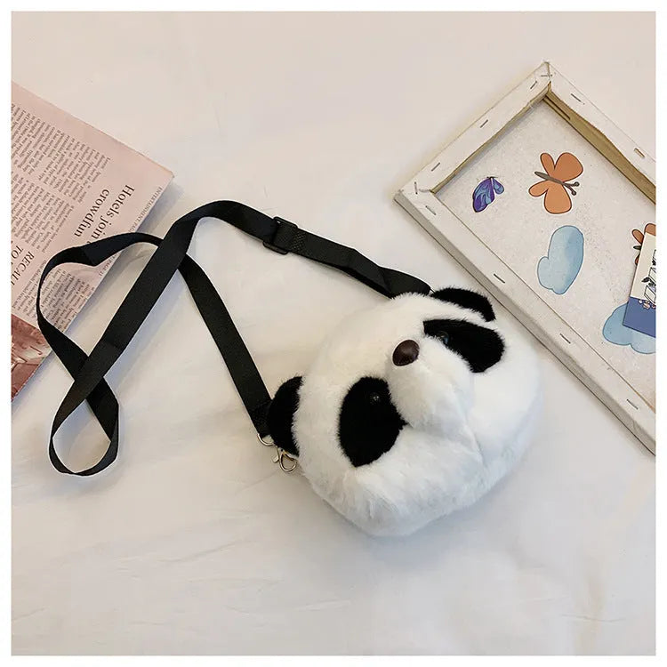 Soft plush cylindrical crossbody bag in Panda Head colour, showing dimensions and sandwich pocket.