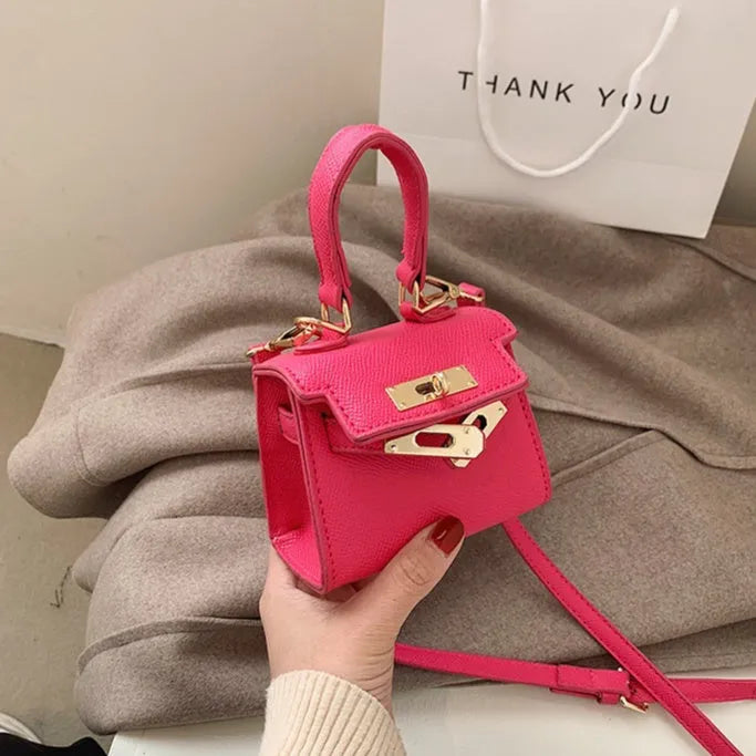 Mini one shoulder crossbody handbag, PU small square bag with lock closure, solid colour, front view