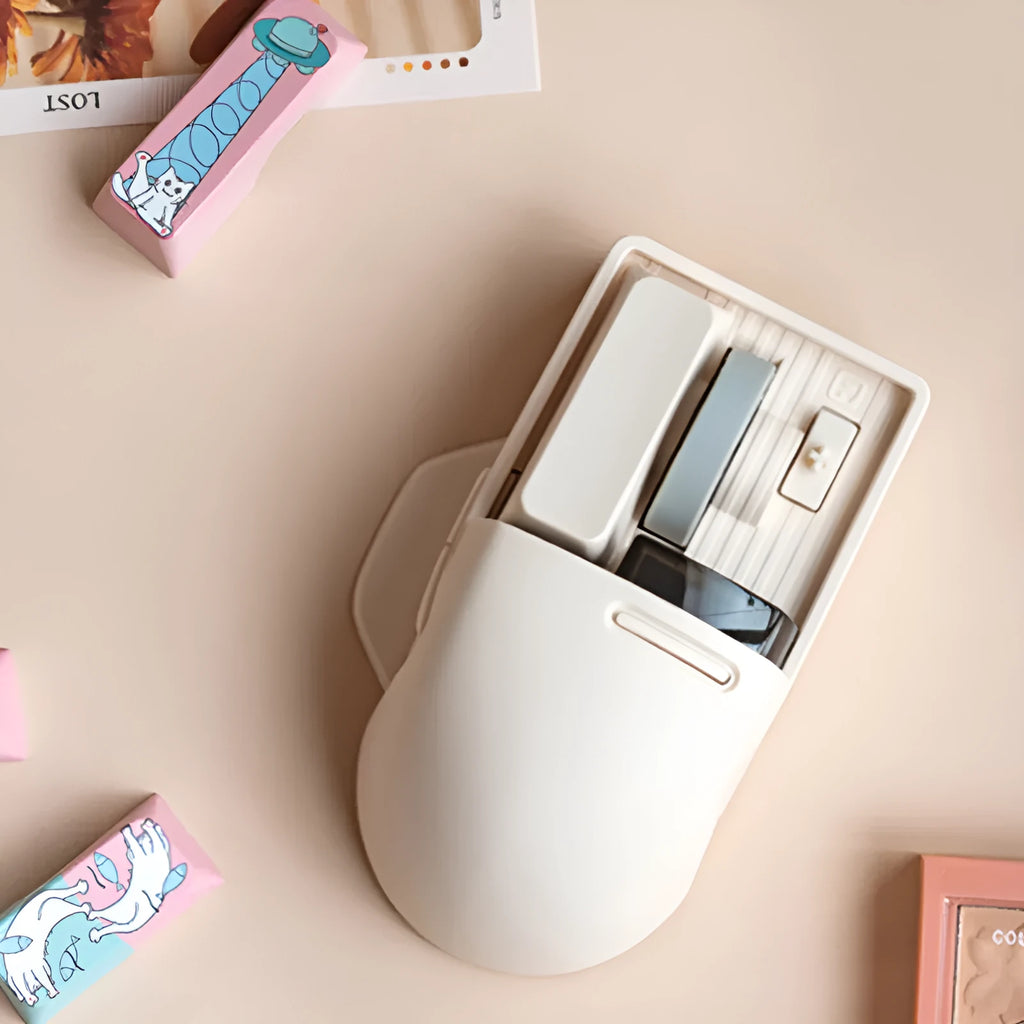Xiaoqiao tofu colour wireless mouse with ergonomic design on a desk