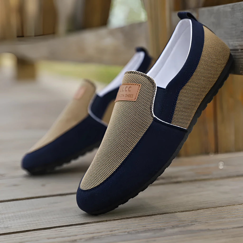 Men's grey and khaki canvas board shoes with round toe and rubber sole.