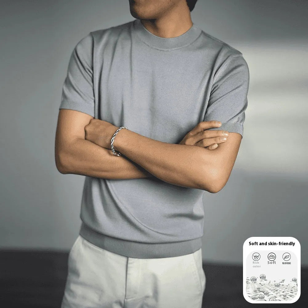 Men's silver grey knitted round neck t-shirt with short sleeves on a hanger.