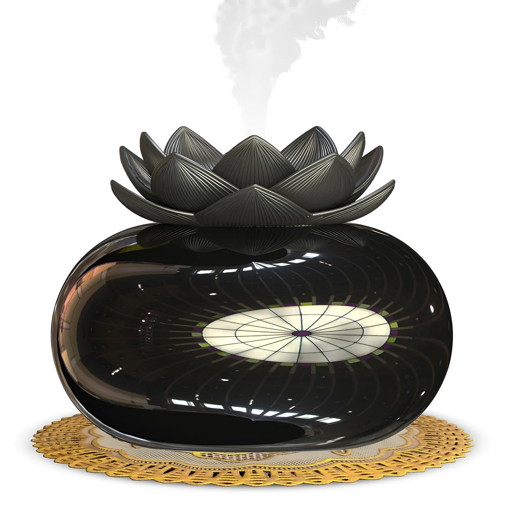 Pure black round Lotus ultrasonic aromatherapy humidifier with USB cable.