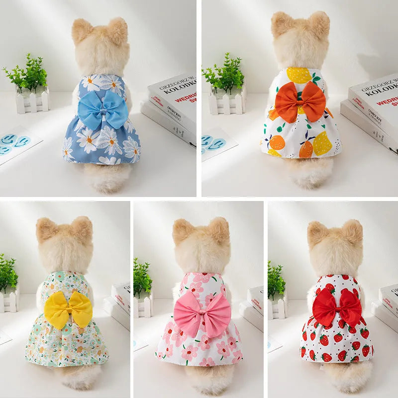 Ultra-thin floral print pet dress for dogs or cats with a large knotted bow at the chest.