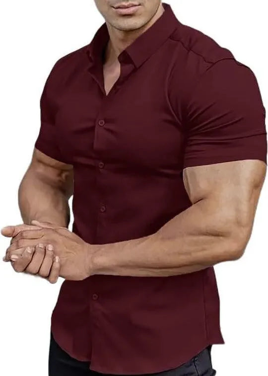 Man wearing a brown short sleeve printed casual shirt with a collar.