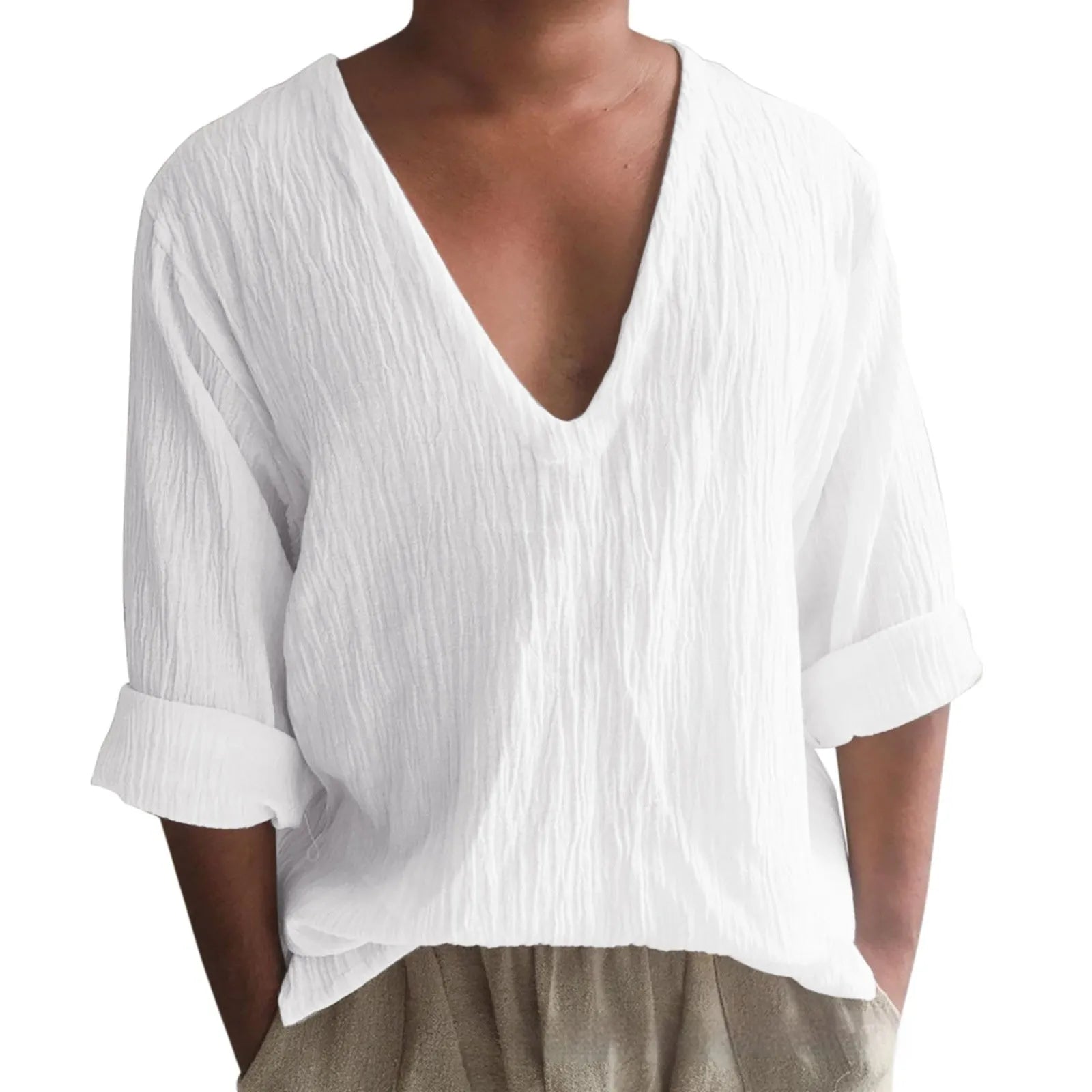 Man wearing a washed cotton long sleeve V-neck t-shirt in a solid colour.