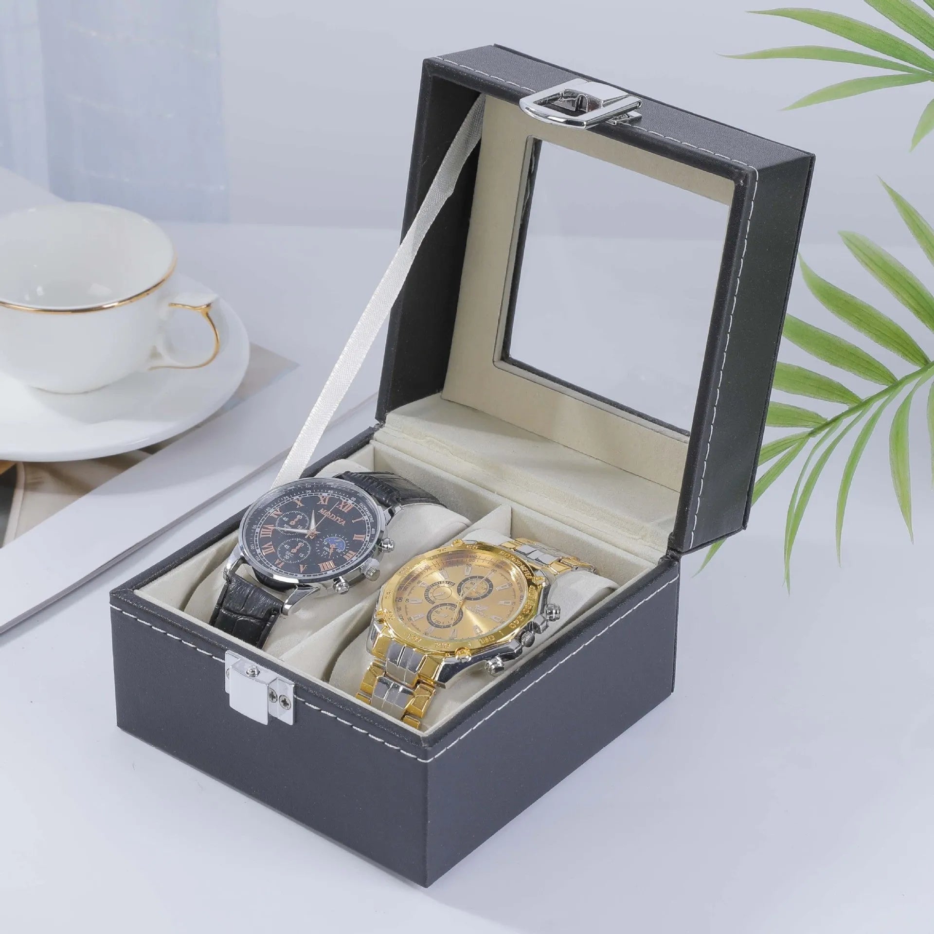 Grey high-grade leather watch storage box with a clear see-through lid, shown holding multiple watches.