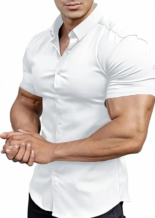 Man wearing a brown short sleeve printed casual shirt with a collar.