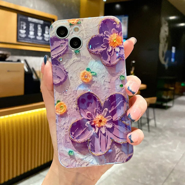 Purple and yellow soft silicone phone cases with an inlaid oil painting flower and diamond drop glue design.