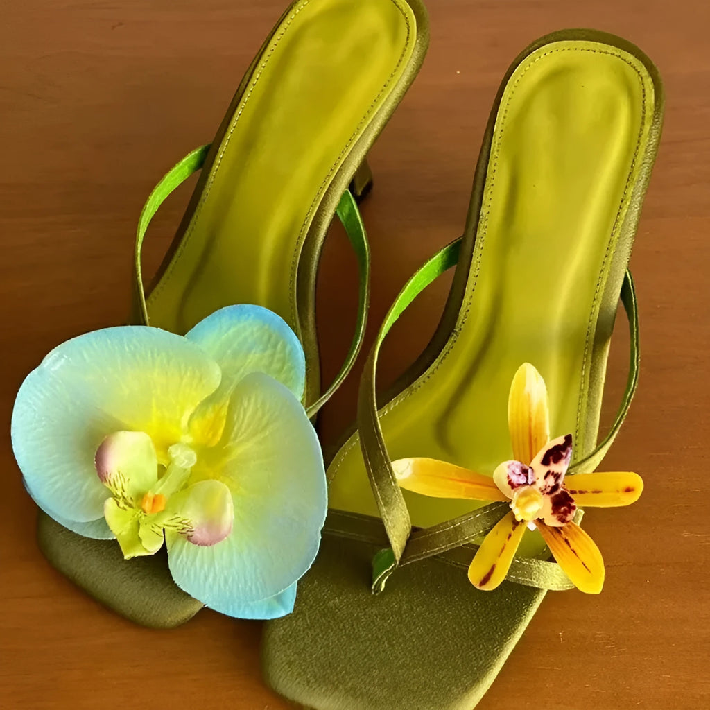 Handmade women's asymmetric flower sandals with high heel and square toe in black, green, pink, or white