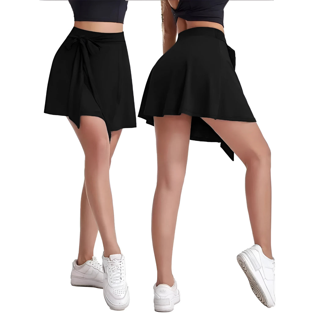 Black thigh-length sports culotte skirt with built-in shorts and an adjustable shoulder strap