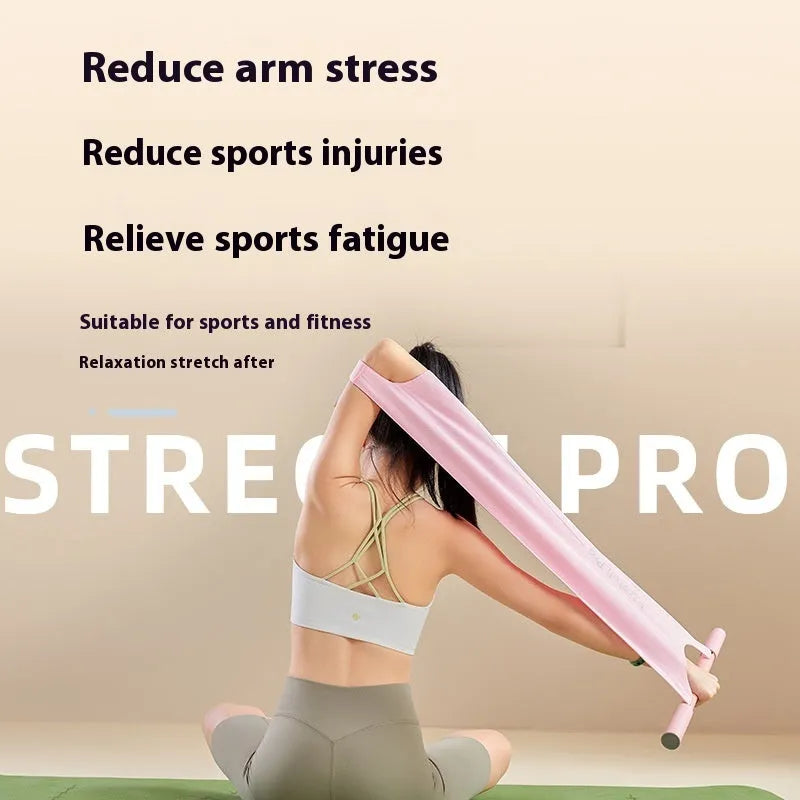 Grey and pink 42cm long yoga stretching tool with curved design for shoulder and back stretches.