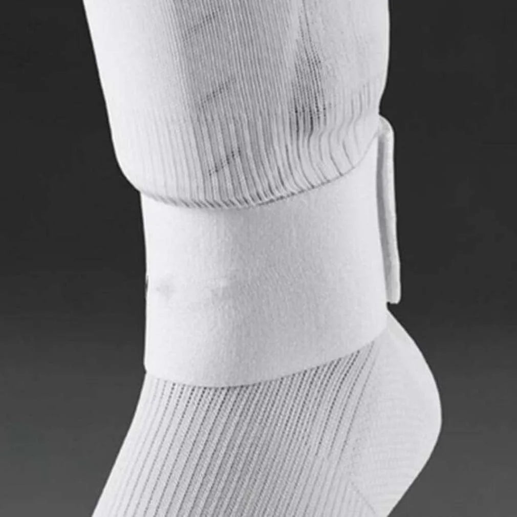 Silicone rubber shin guard fixing strap in red, shown stretched
