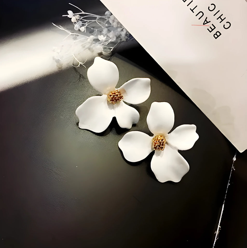 Alloy flower stud earrings with electroplated finish in white and pink colour options