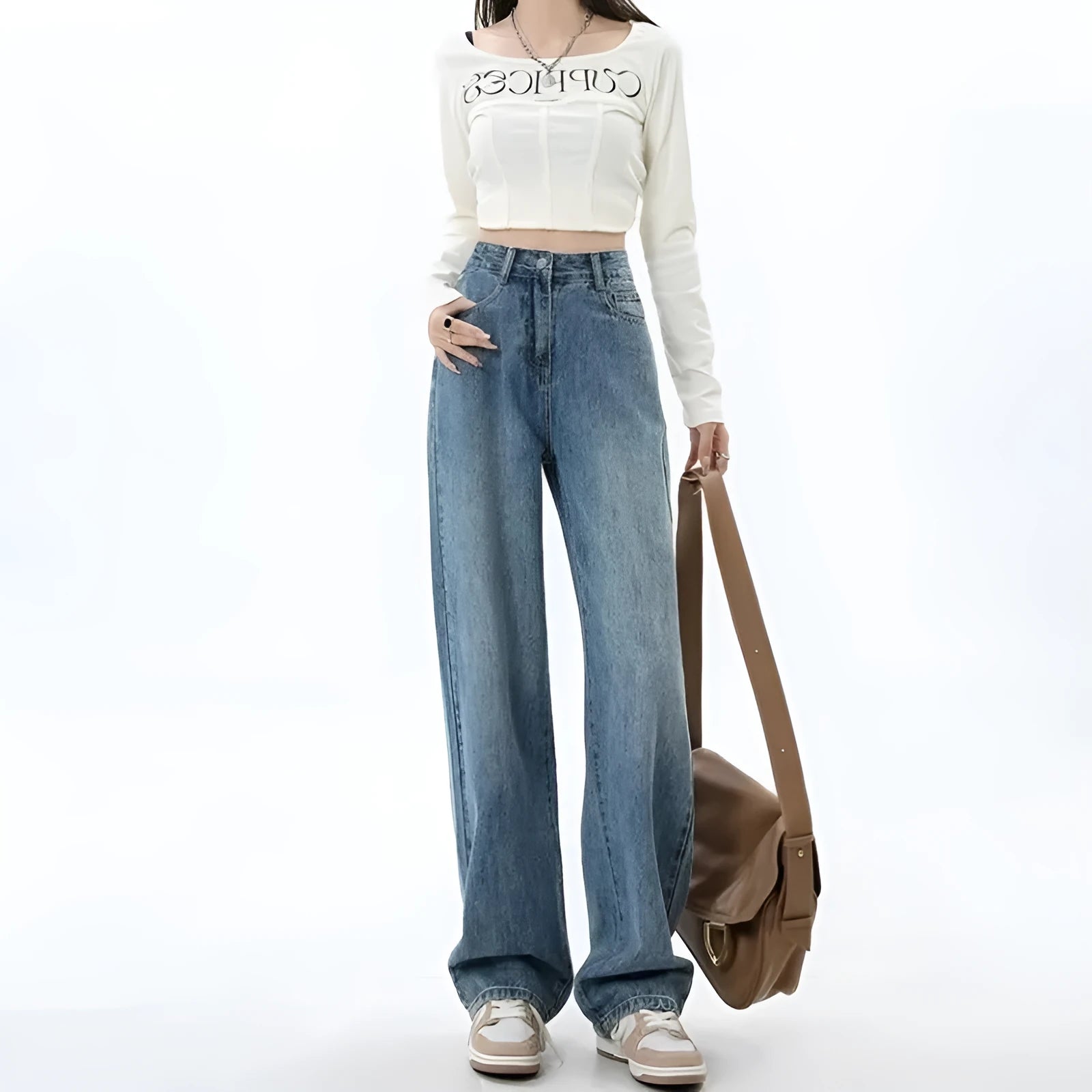 Woman wearing retro blue high-waisted wide-leg denim jeans with a straight-leg cut.