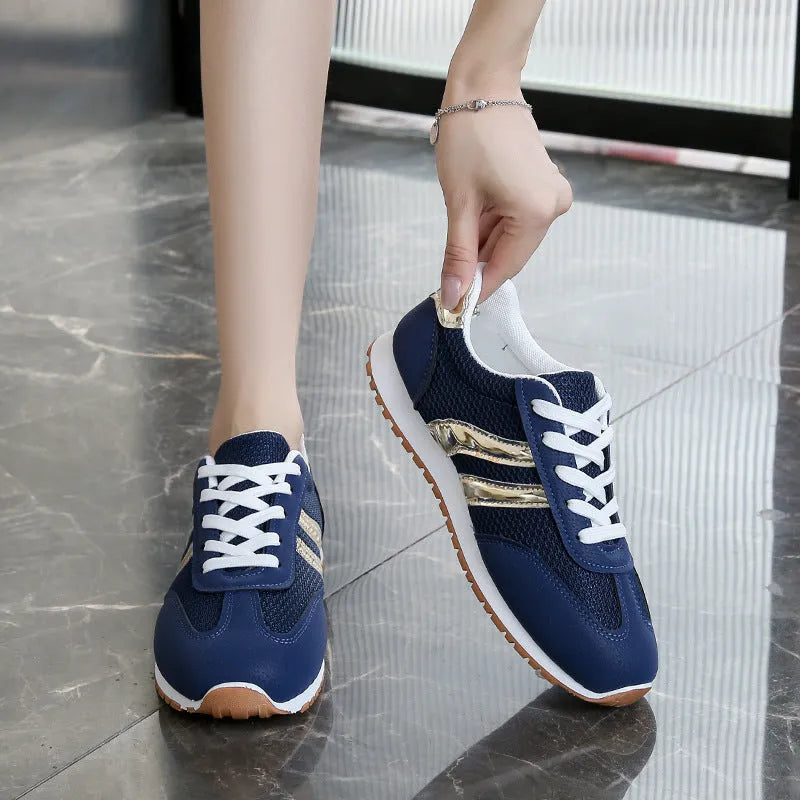 Blue women's casual tennis shoes with cross shoulder straps and non-slip rubber soles