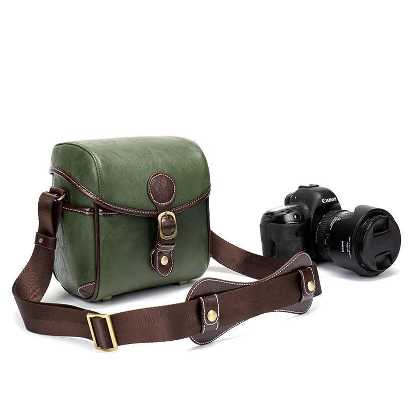 Single shoulder SLR camera liner bag in PU leather with polyester cotton insert, shown in reddish brown