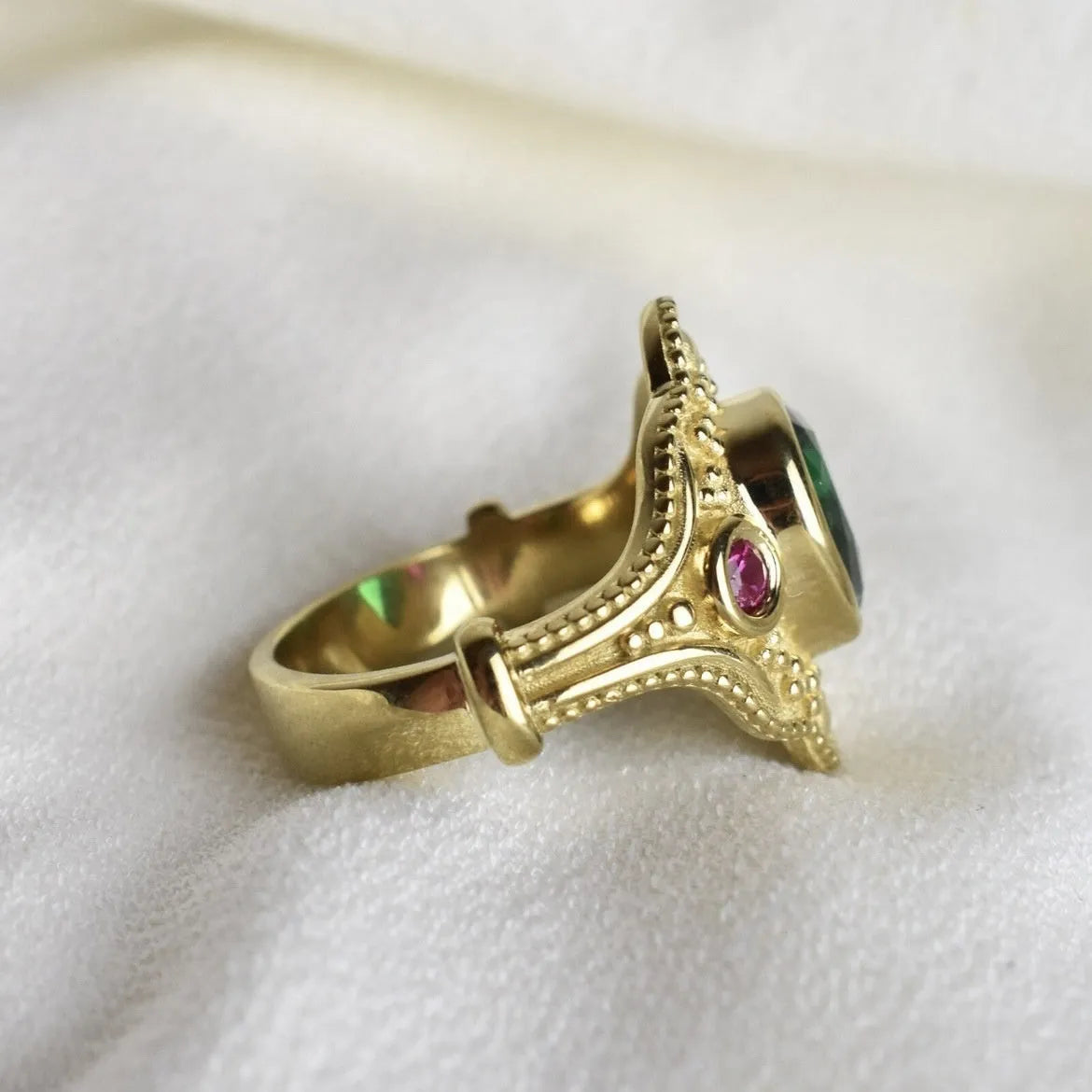 Women's golden Lvzuan geometric ring electroplated on alloy, shown on a hand