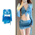 Women's blue high-waisted bikini four-piece swimsuit set with shirt, bra, underwear, and skirt for beach wear