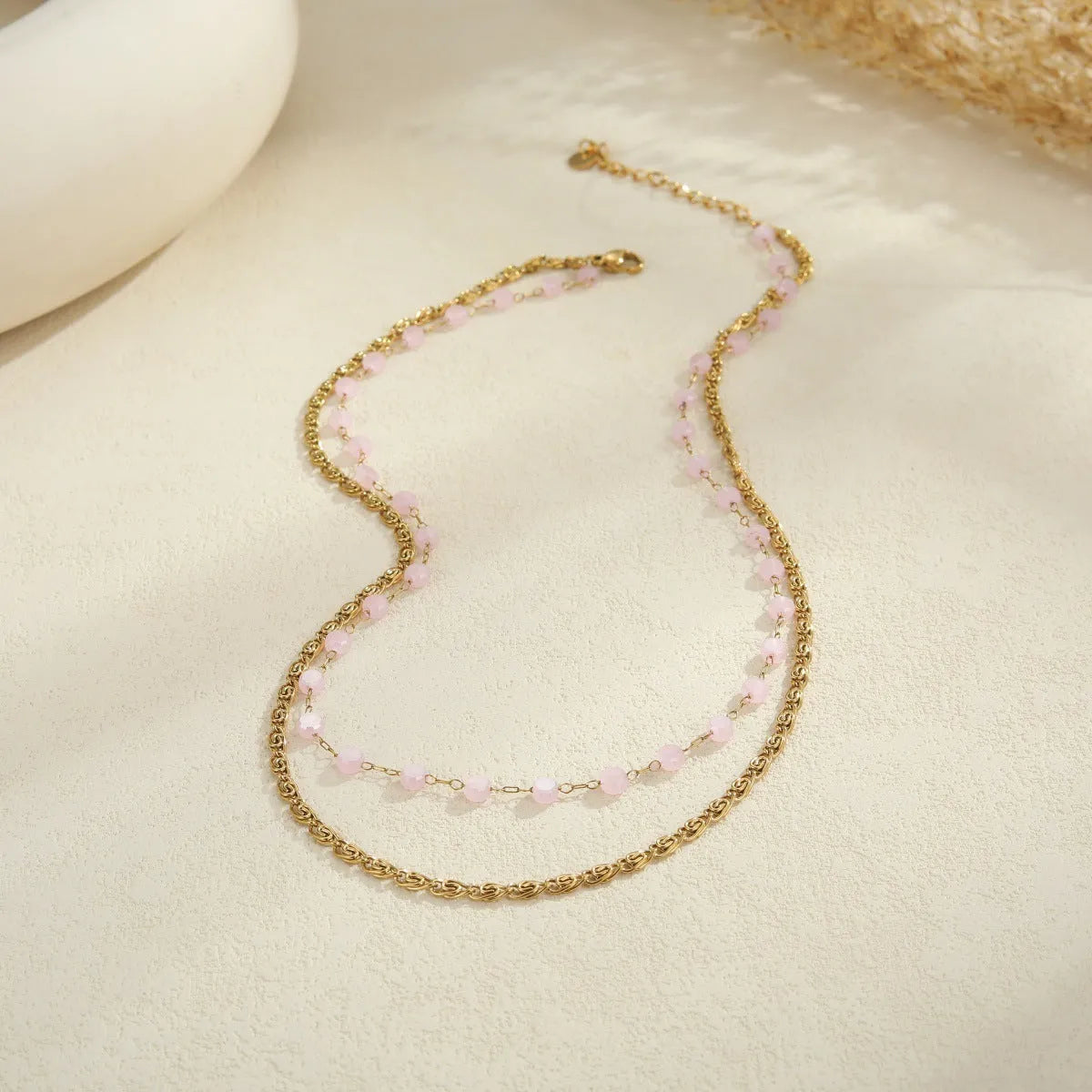 Stainless steel zircon necklace clavicle chain with beaded blue bracelet set geometric pendant on white background