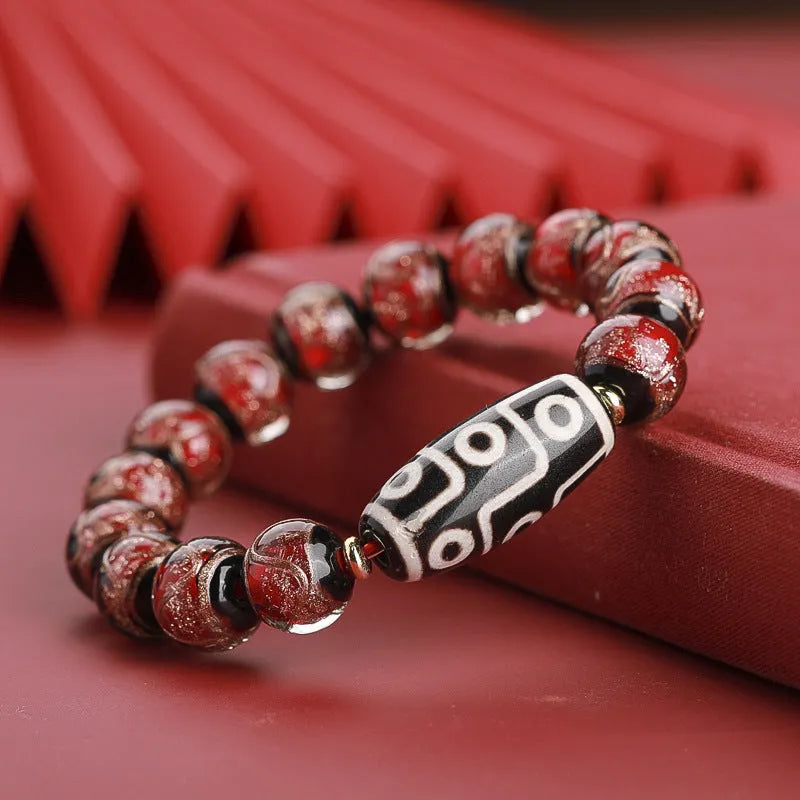Chinese-style five-colour glaze bracelet with snake motifs and manual beadwork.