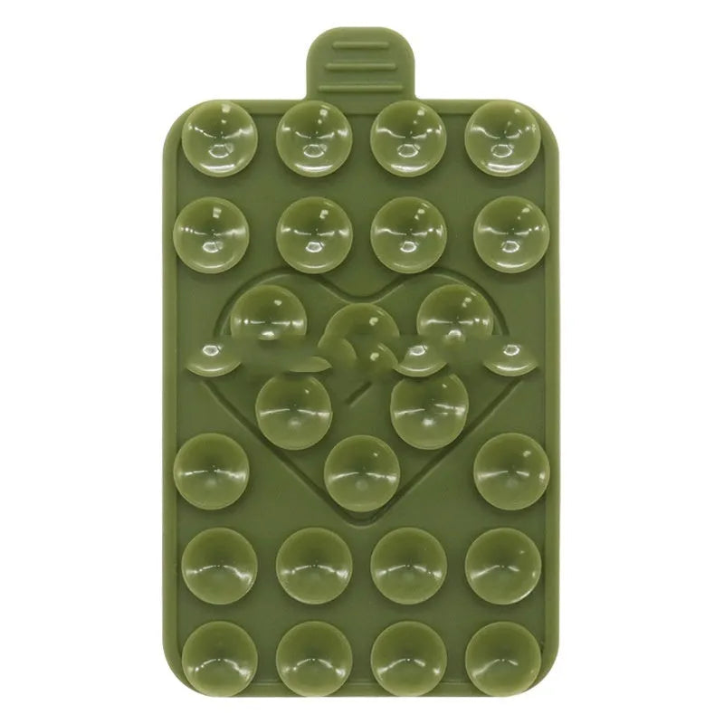 Double sided silicone suction cup phone case holder in gray white, showing hot pressed construction for universal fit on smooth surfaces
