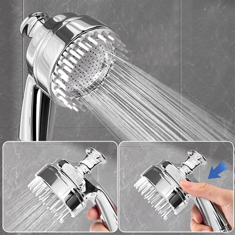 Silver coloured dog shower attachment with ergonomic grip and soft silicone comb teeth.