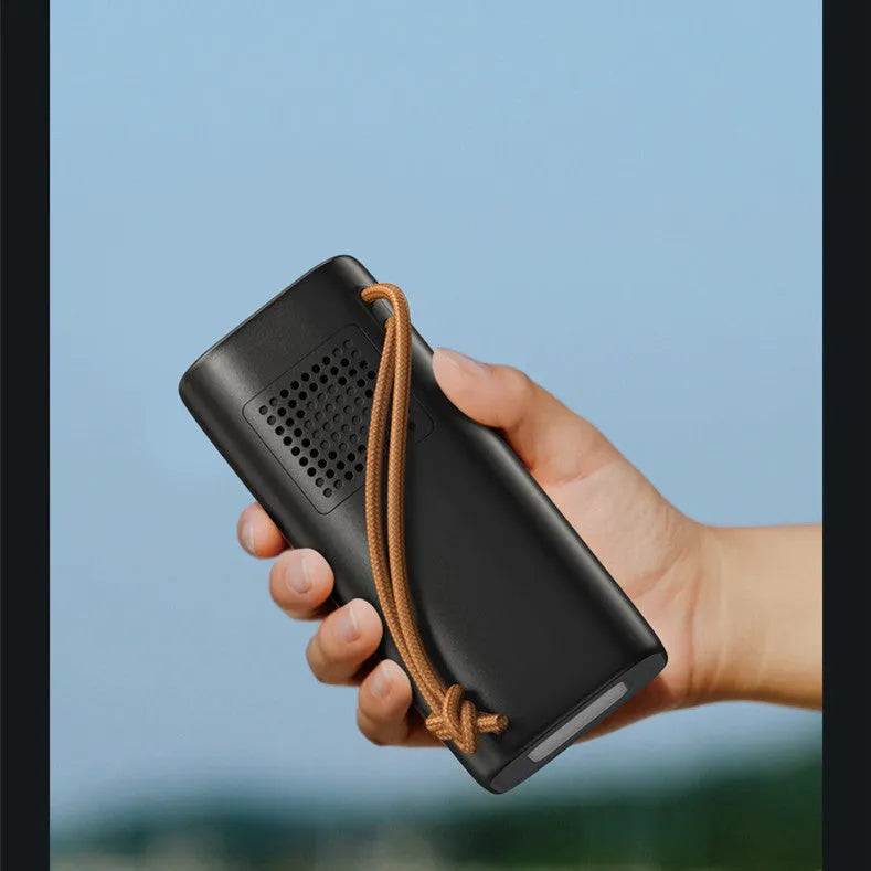Black emergency power bank with 200W output, solar panel charging capability, and dimensions of 70x70x162mm