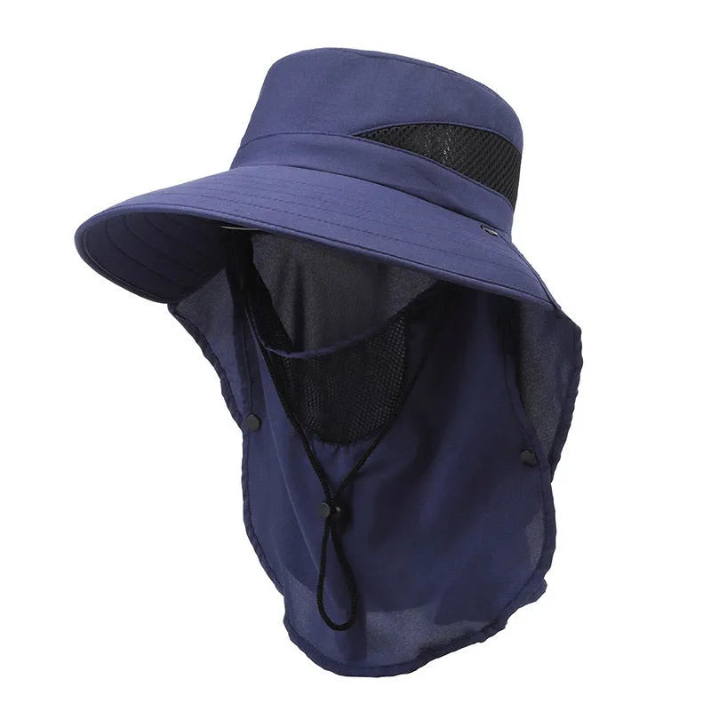Men's grey fisherman hat with wide brim, shown from the side on a wooden post outdoors.