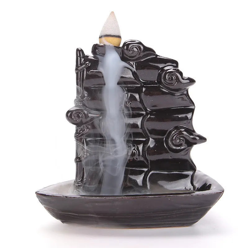 Ceramic backflow incense burner in a modern simple style, shown in one of four colour variations.