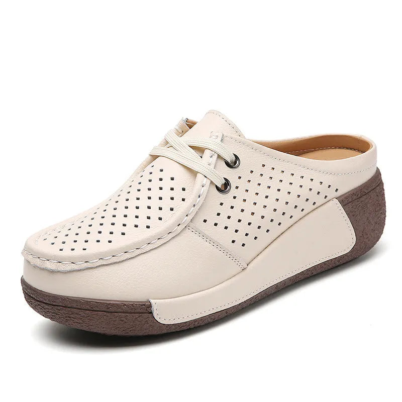 Plus size women's genuine leather platform slippers in black with round toe and hollow-out wedge sole