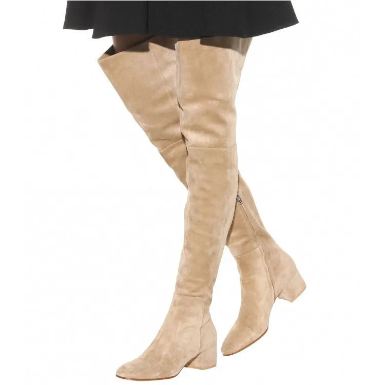 Grey suede women's flat over the knee boots with a pointed toe and thick low heel.