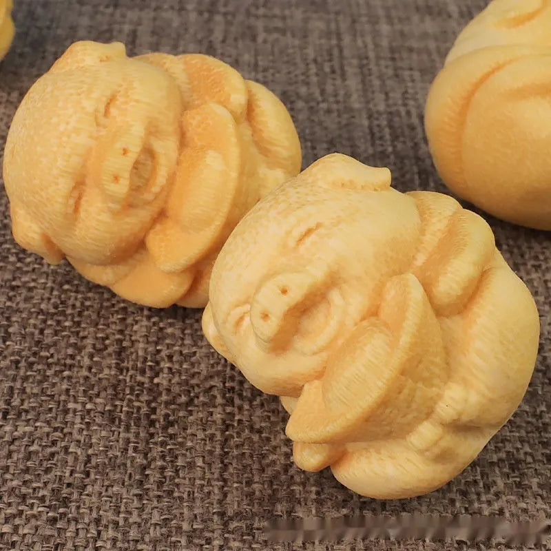 Solid bamboo carving ornament with cute pig design measuring 4cm tall