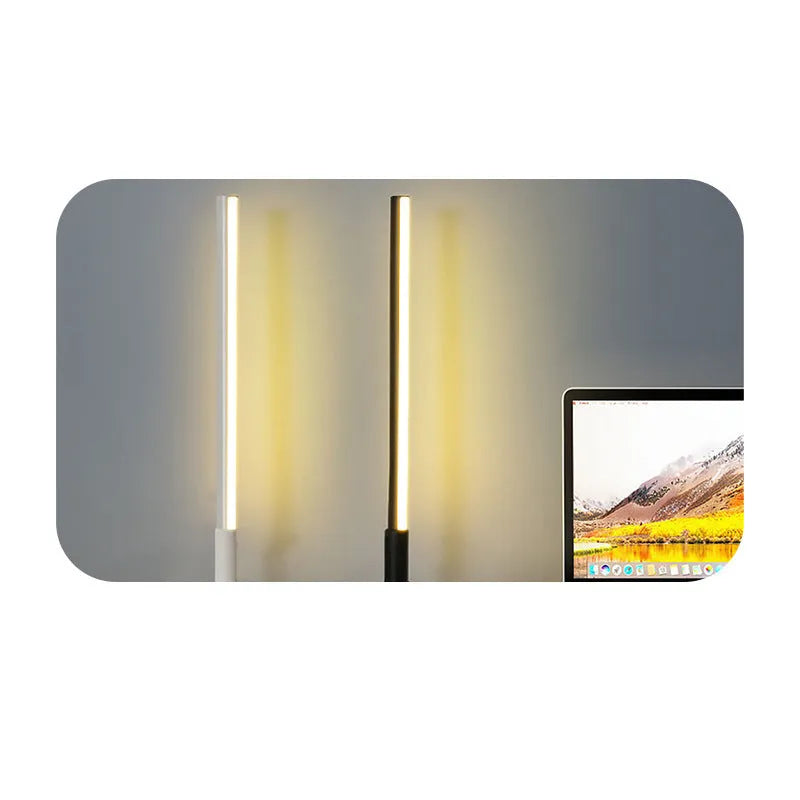 Simple retro black decorative atmosphere lamp with aluminium alloy body on a side table.