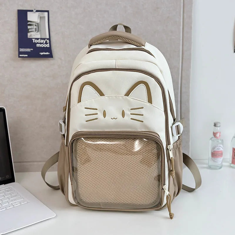 Korean cartoon backpack in multiple colours with curved shoulder straps and badge pendant options