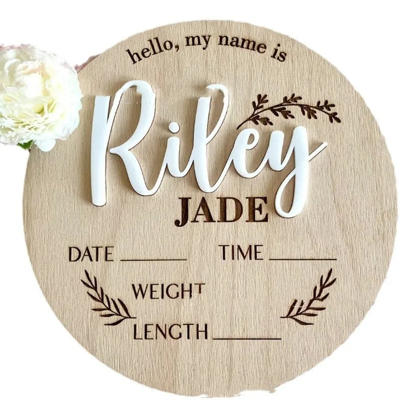 Square wooden baby name plaque with birth information, 15cm by 15cm.