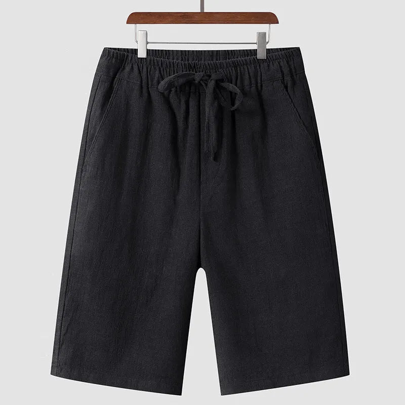 Men's linen shorts in loose cropped style with elastic waistband in various colours