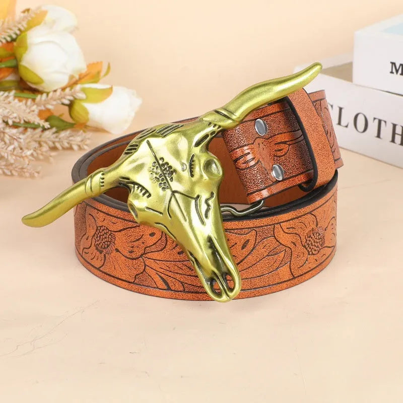 Men's brown imitation leather belt with a detailed silver alloy cow head buckle and pin buckle fastening.