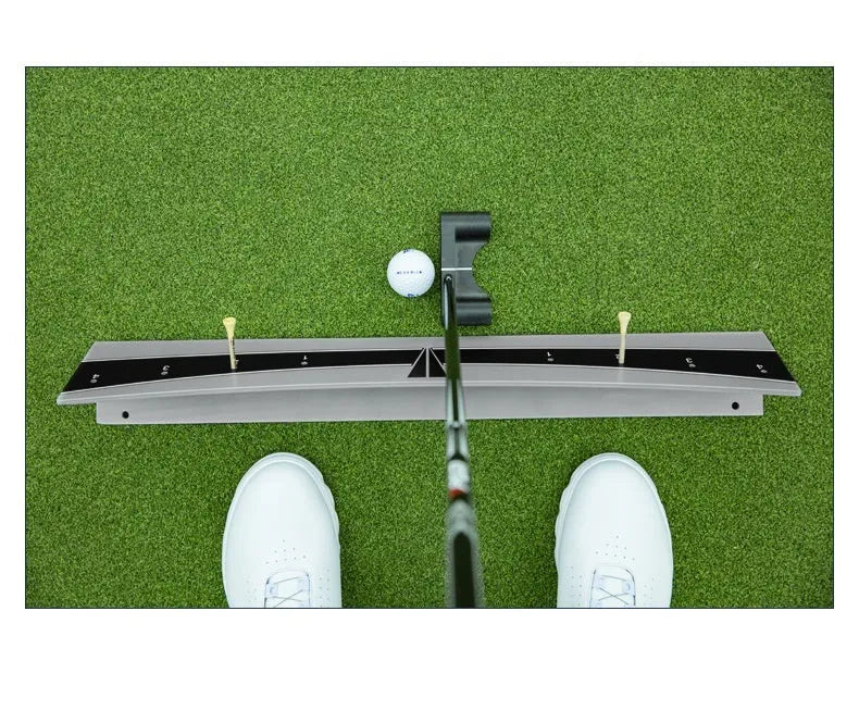 Golf putter with attached adjustable trajectory balance simulator, a PVC training aid for stroke feedback.